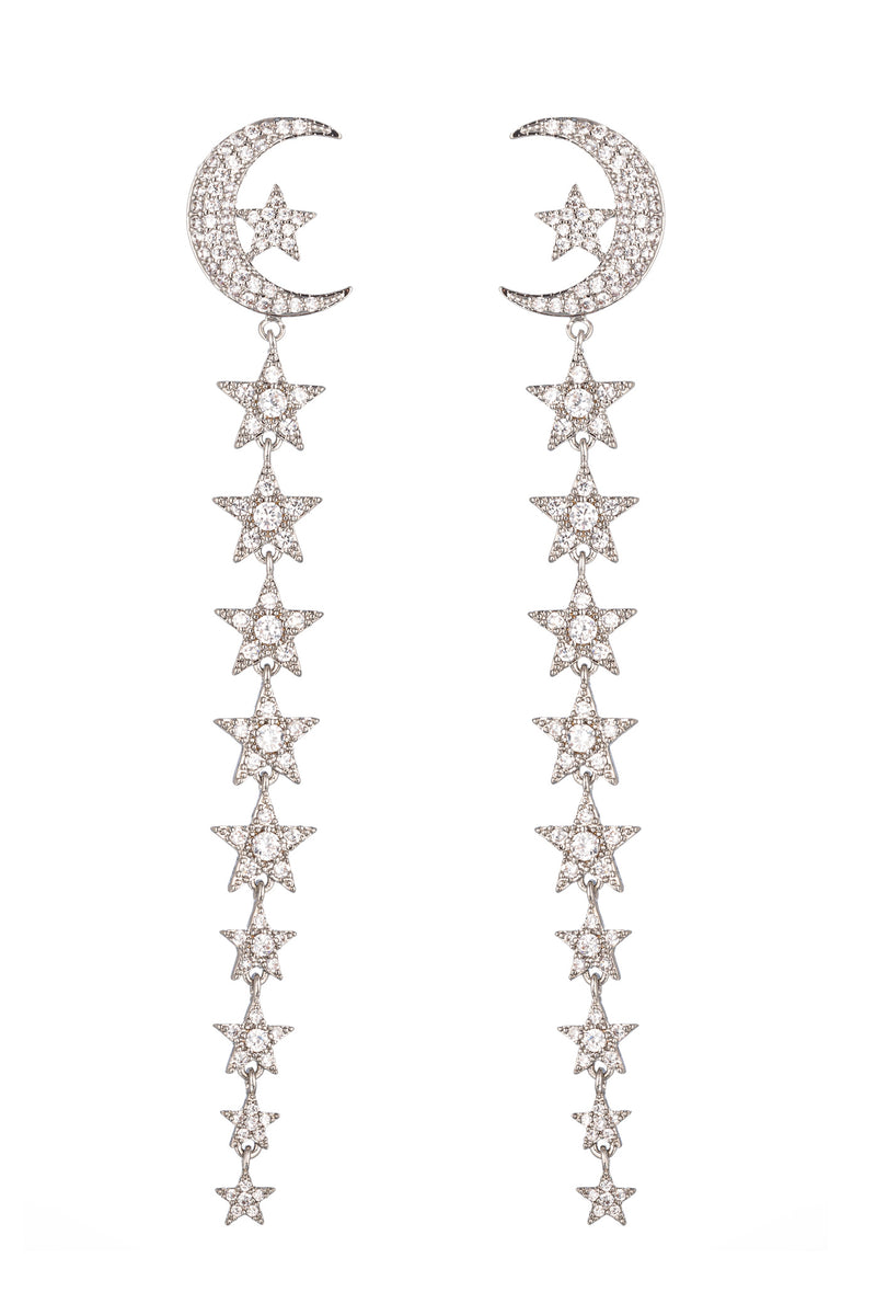 Silver tone brass moon & star long earrings studded with CZ crystals.