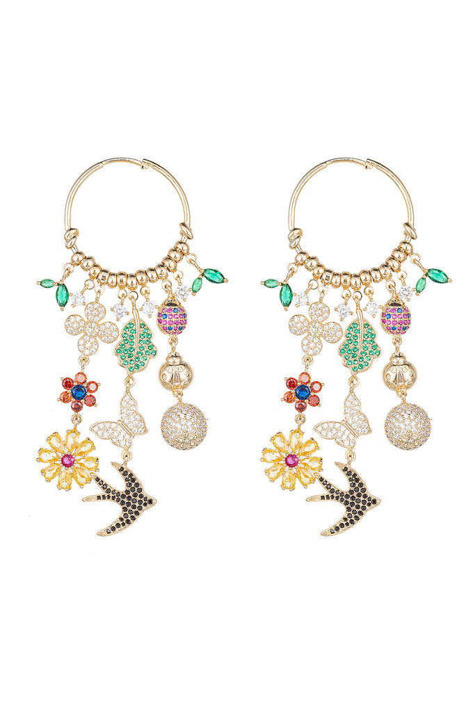 Gold tone brass statement earrings with multiple charms that are all studded with CZ crystals.