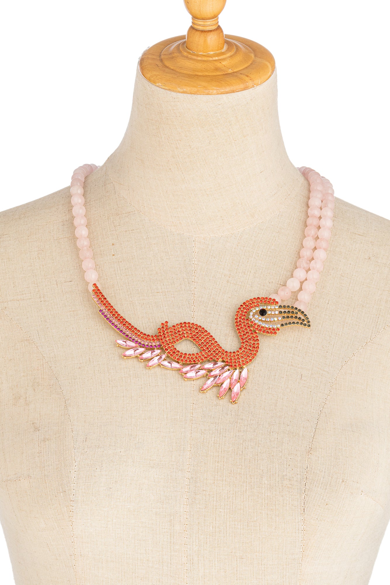 Rose quartz beaded statement necklace with a glass crystal flamingo pendant.