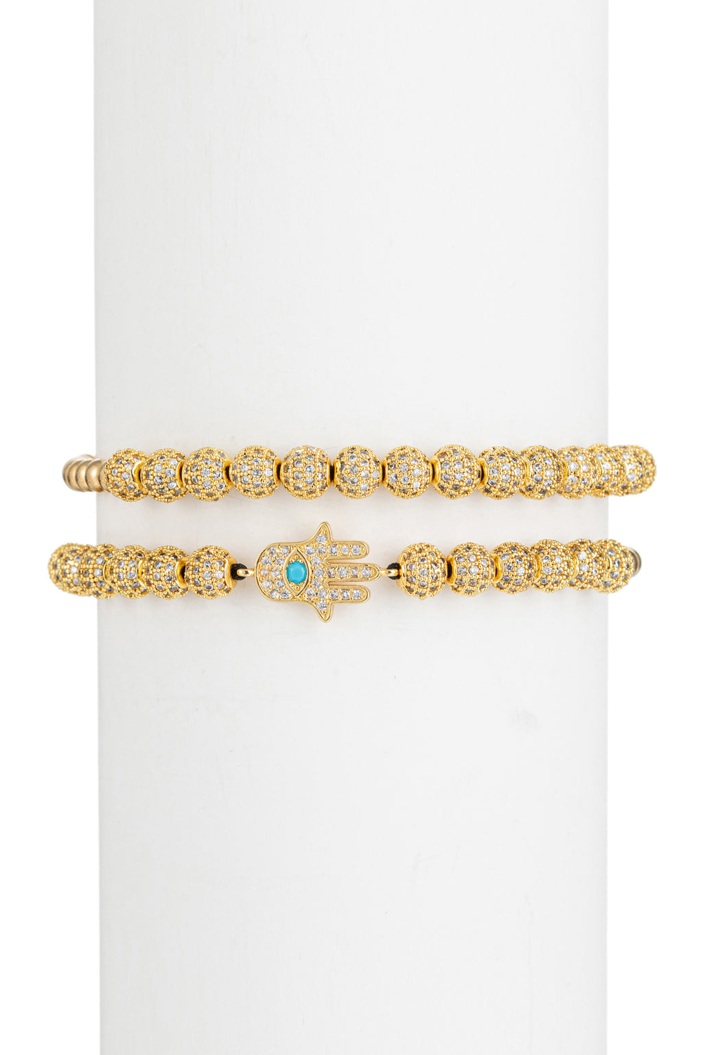 Hamsa hand titanium beaded bracelet studded with CZ brass charms.