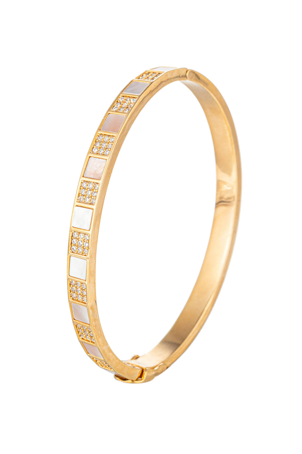 Gold tone titanium cuff bracelet studded with CZ crystals.