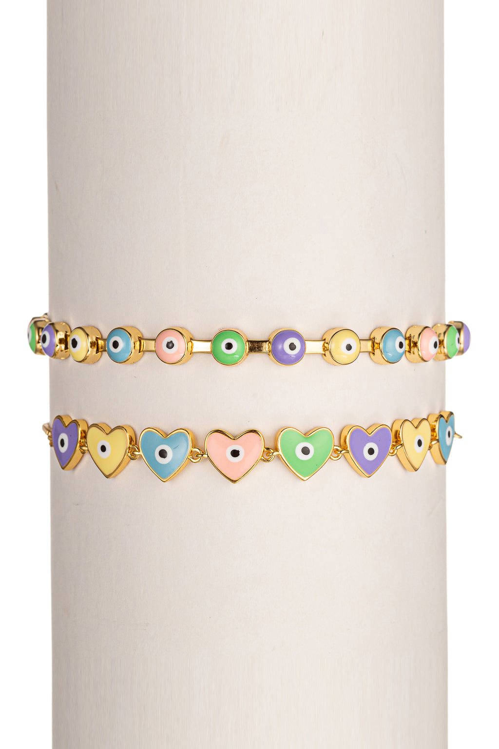 Gold tone brass bracelet set with pastel colored enamel heart & eye pendants.