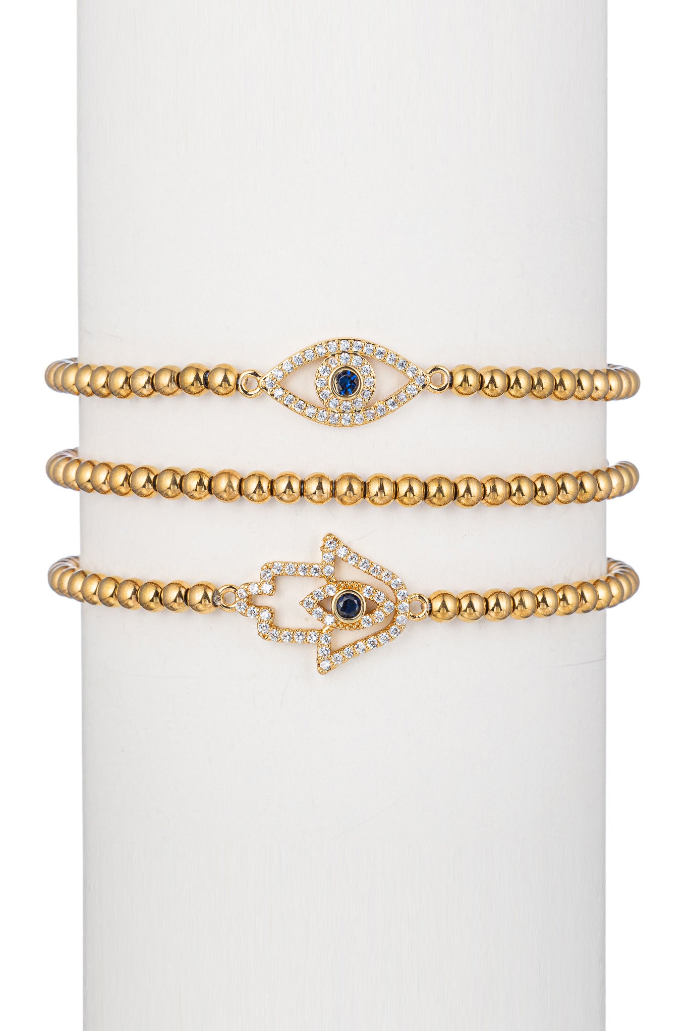 Eye and hamsa hand pendant bracelets studded with CZ crystals.