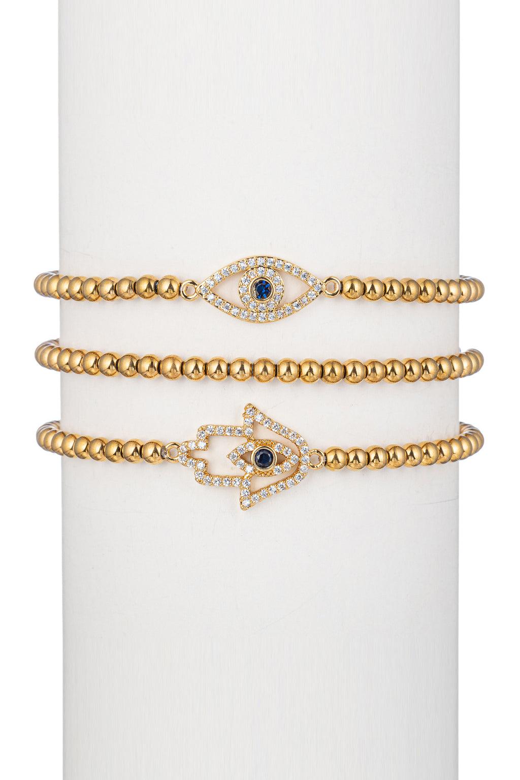 Eye and hamsa hand pendant bracelets studded with CZ crystals.