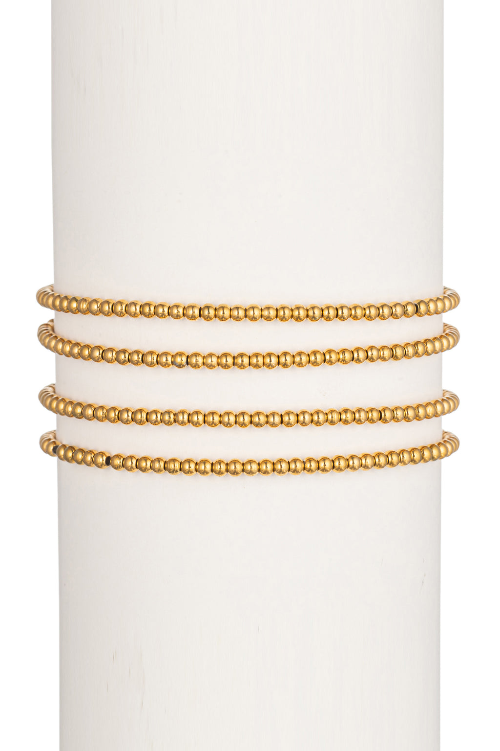 Gold tone titanium 3mm stretch band beaded bracelet set.