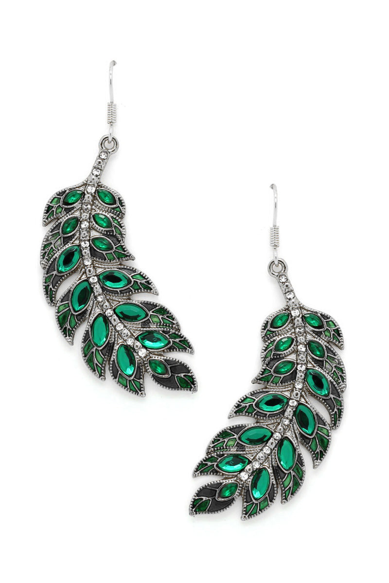 Silver tone alloy leaf pendant earrings studded with glass crystals.