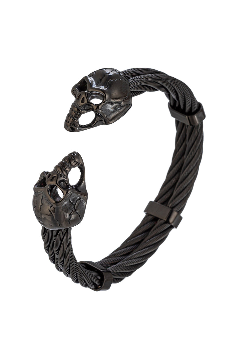 Black tone titanium double skull cuff bracelet. 