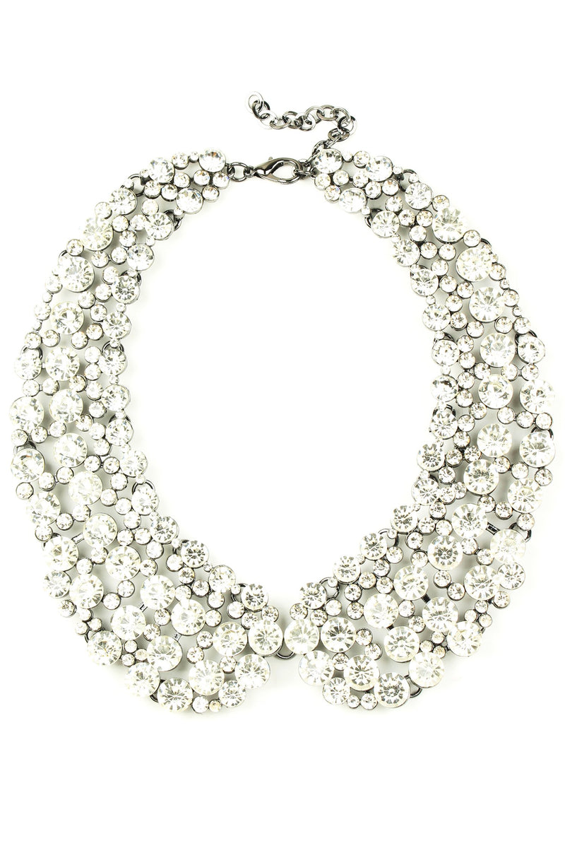 12 inch collar necklace with circular white crystals arranged in collar pattern.