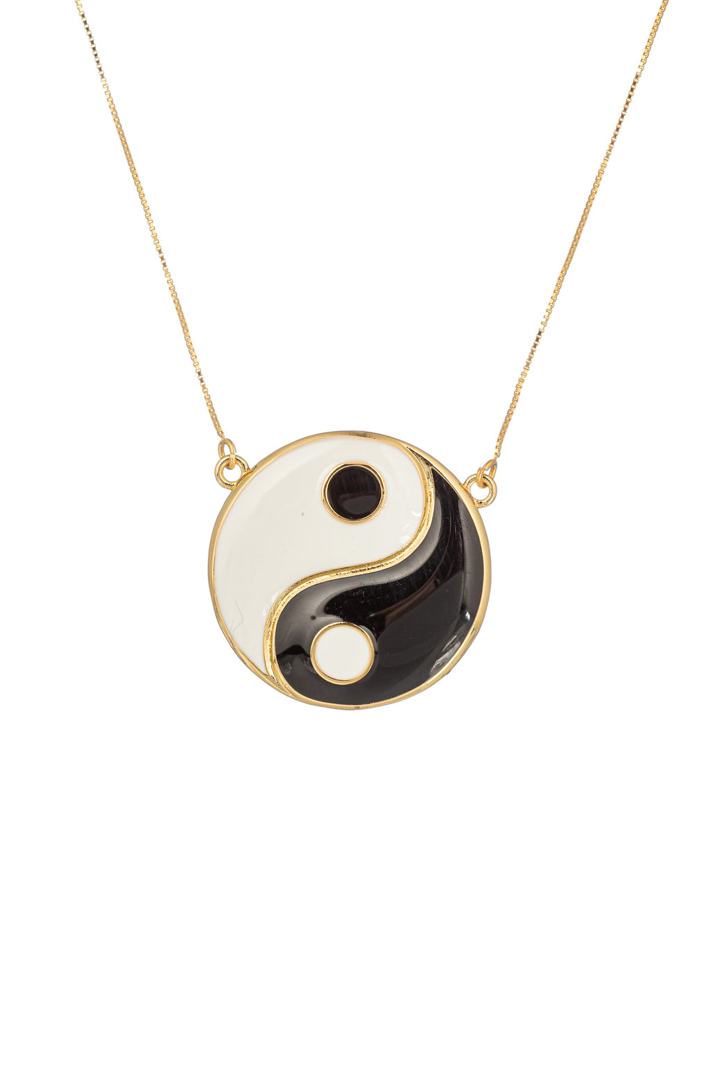 Gold tone brass yin & yang pendant on a sterling silver chain.