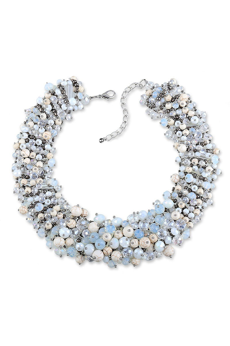 Silver tone brass pastel statement collar necklace studded with glass crystals.