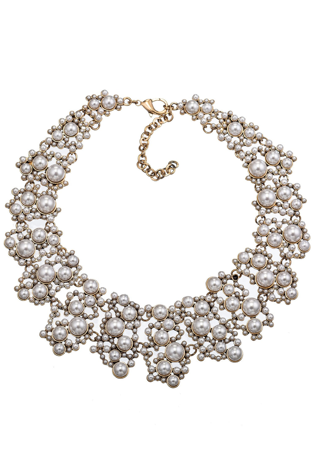 Large collar necklace with beaded pearl design. Features gold tone metal with collar arrangement of glass pearls. Also features lobster clasp closure.