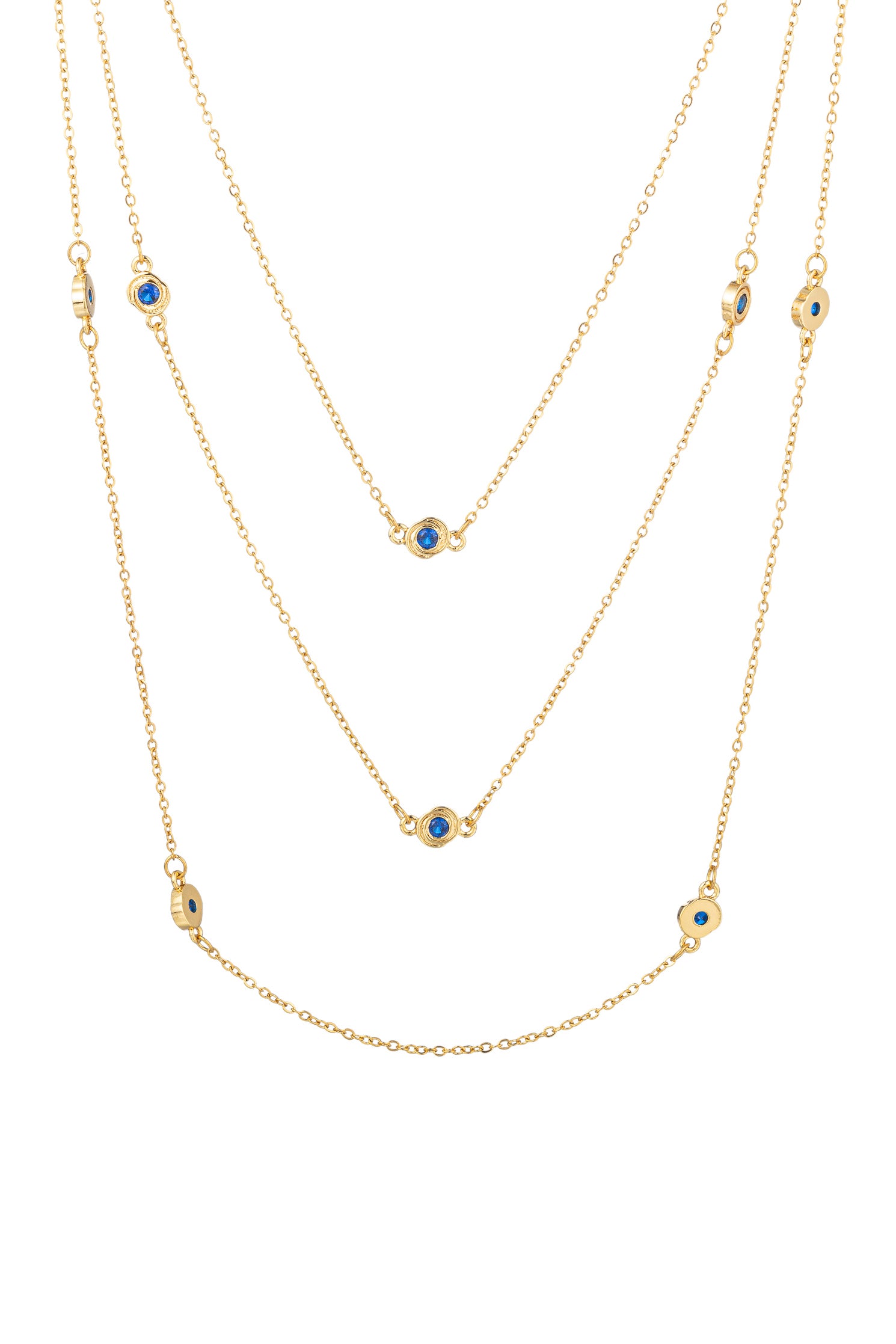Gold tone brass 3-piece necklace set studded with blue CZ crystals.