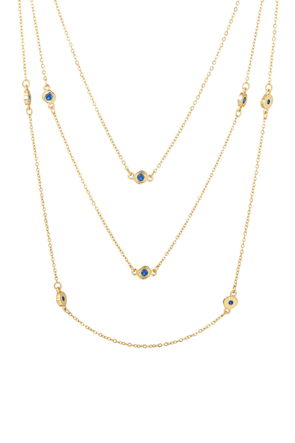 Gold tone brass 3-piece necklace set studded with blue CZ crystals.