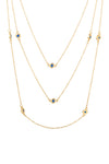 Gold tone brass 3-piece necklace set studded with blue CZ crystals.