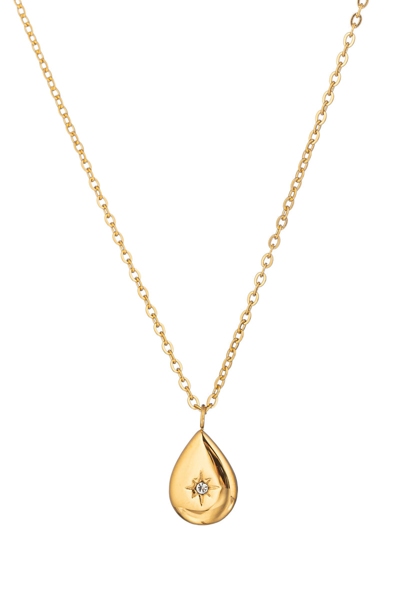 Gold tone titanium tear drop pendant necklace studded with a single CZ crystal.