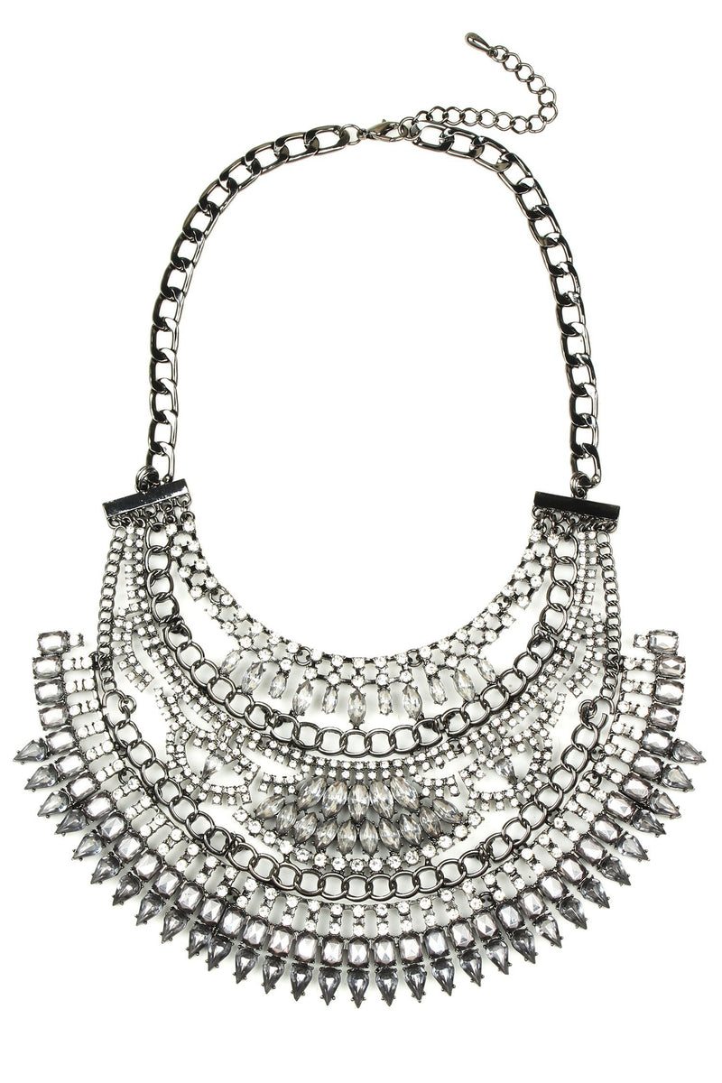 Silver layered necklace approximately 14 inches in length. This piece is adorned with faceted crystals and conveys a Victorian gothic style.