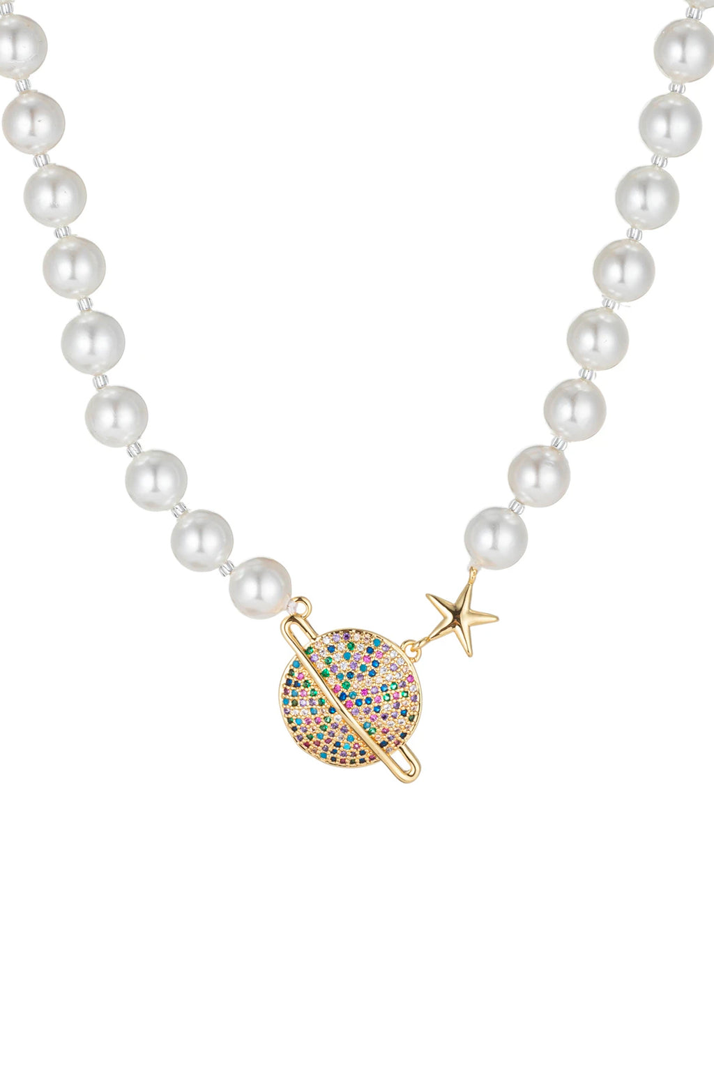 Shell pearl necklace with a mars pendant studded with CZ crystals.