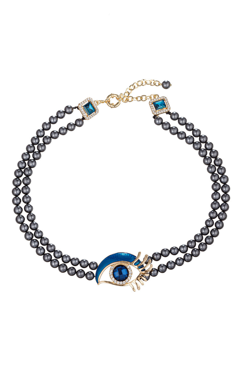 Embrace elegance with this necklace adorned with blue glass pearls, a symbol of timeless beauty