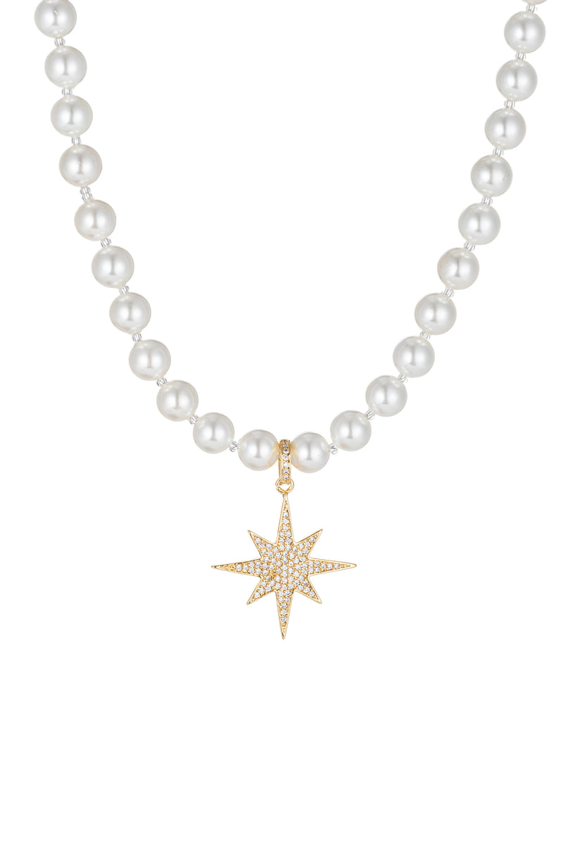 Shell pearl necklace with a north star pendant.