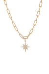 Gold tone brass paperclip necklace with a North Star pendant studded with CZ crystals.