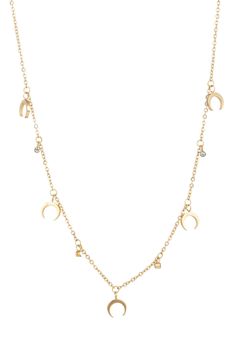 Gold tone brass necklace with brass charms.