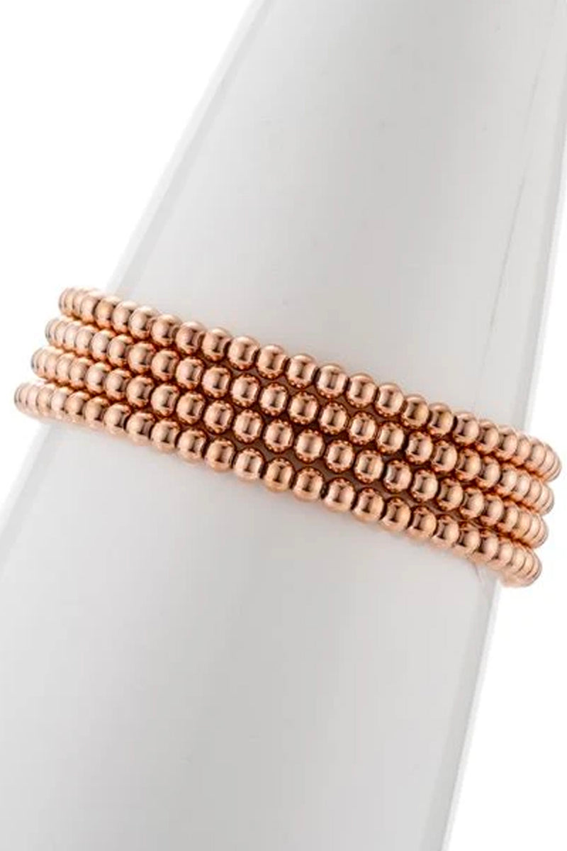 Rose gold beaded bracelet set.