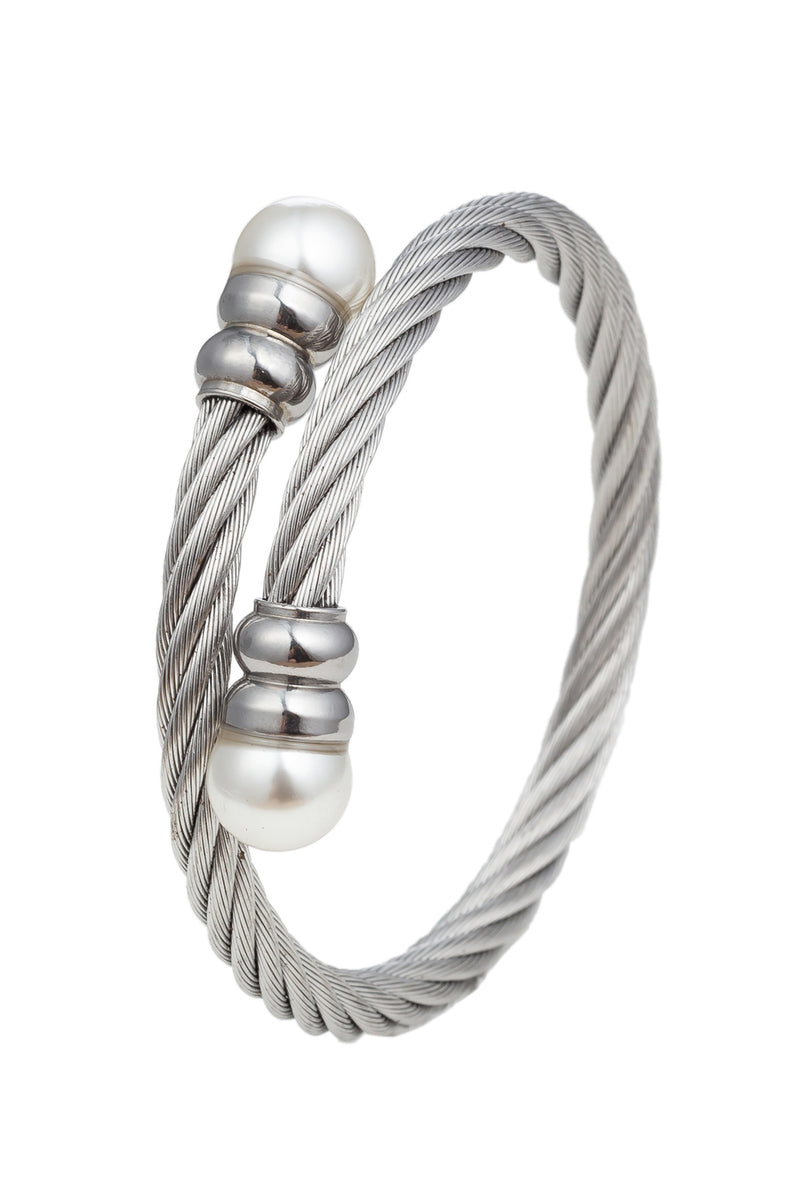 Silver wire titanium wrap cuff bracelet with glass pearls.