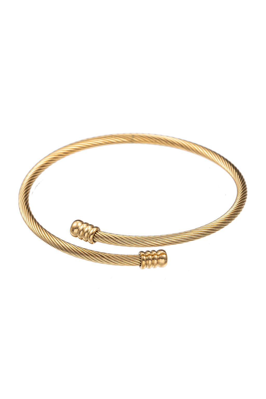 Gold tone titanium wrap coil bracelet.