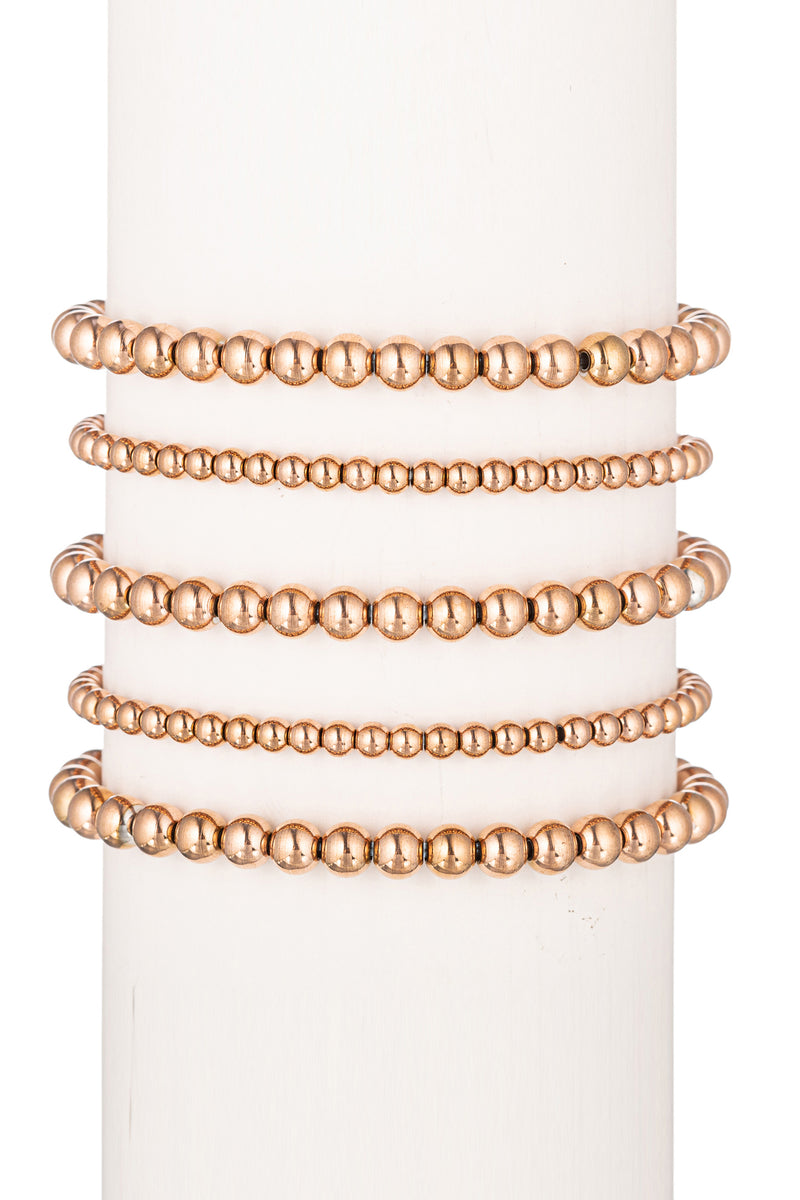 14k gold plated rose gold beaded 5-piece bracelet set.