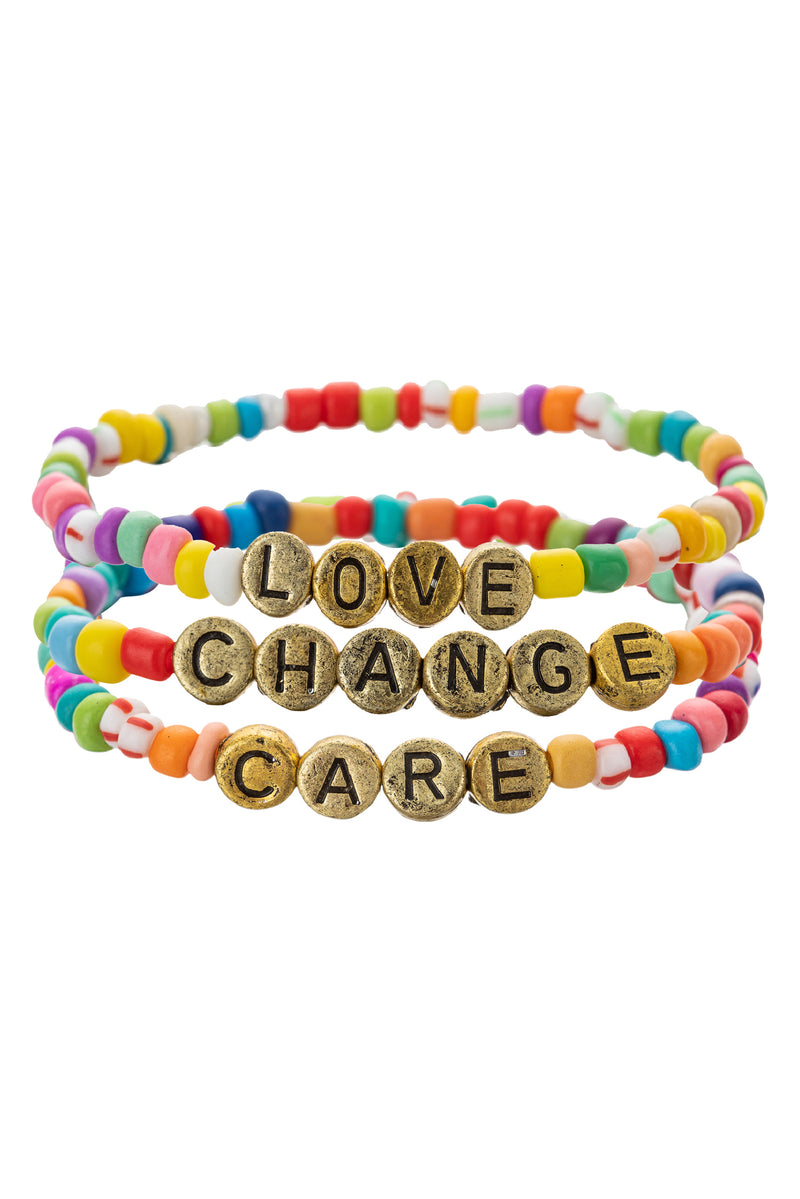 Love, Care, Change Gold Tone Plated Enamel Stretch Bracelet
