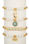 Gold tone brass 4-piece bracelet set with enamel pendants.