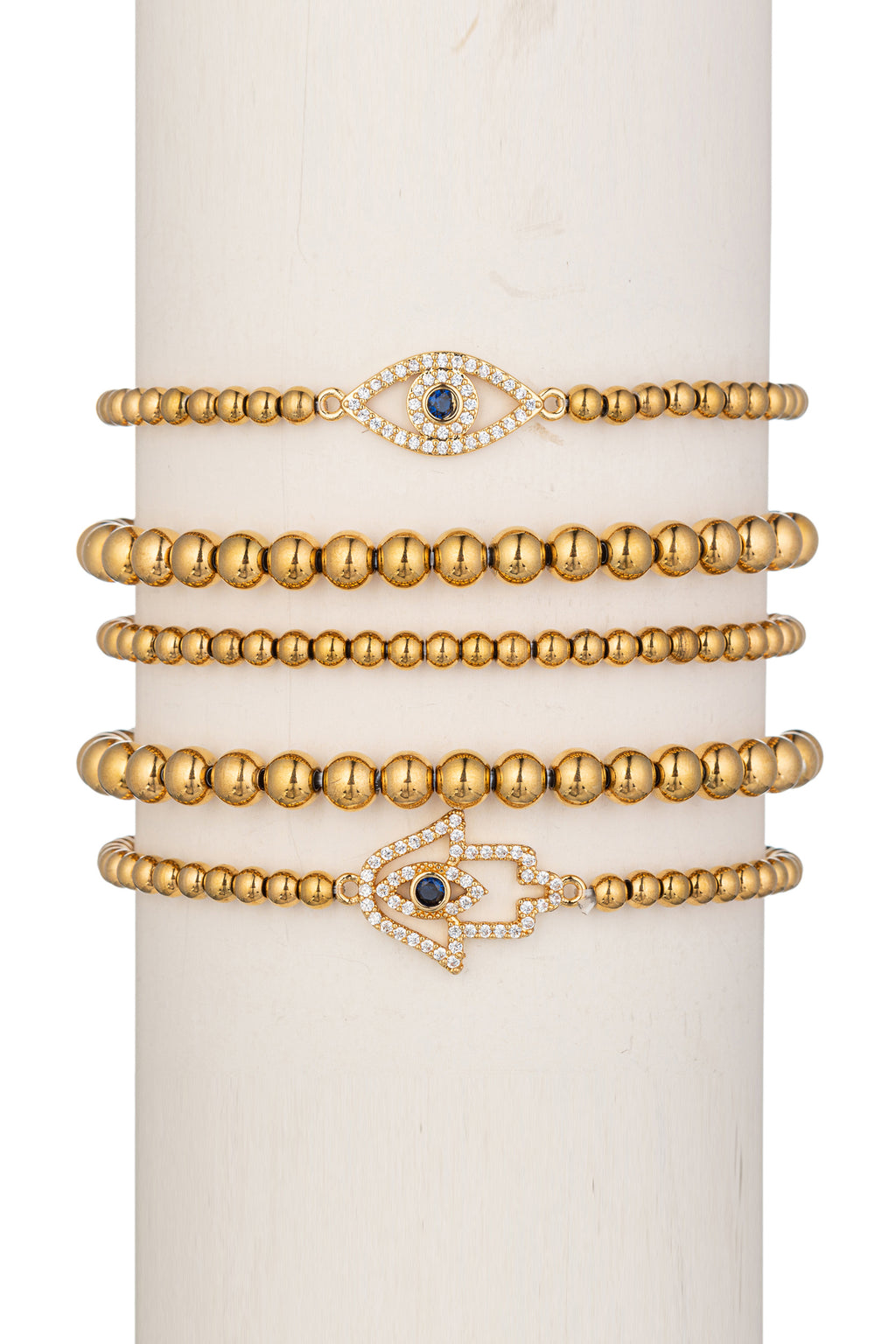 5-piece bracelet set with an eye and hamsa hand pendant studded with CZ crystals.