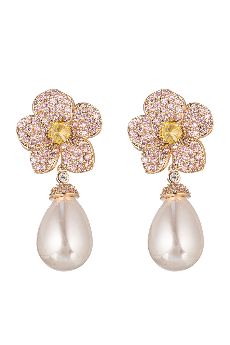 Gold tone brass flower earrings studded with pink CZ crystals.