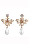 18k gold plated bee earrings with shell pearls.