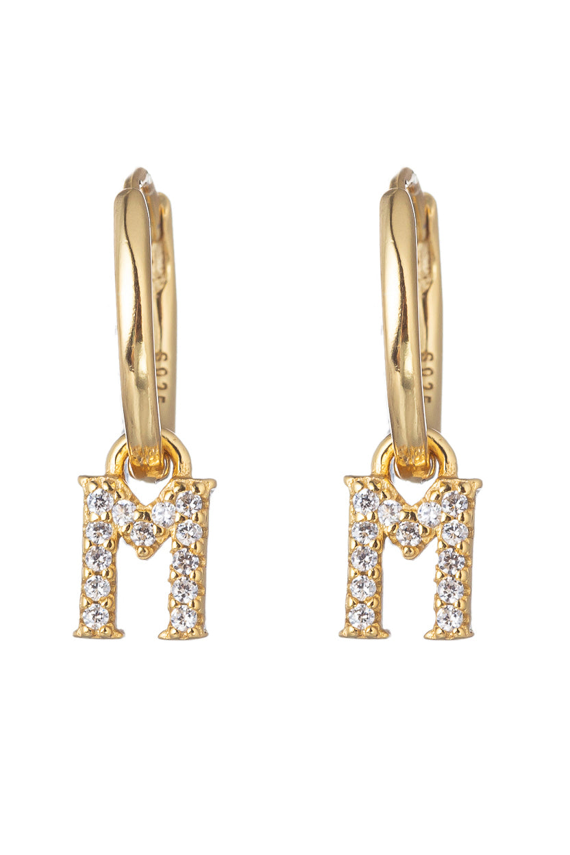 14k gold plated sterling silver "M" initial huggie earrings studded with CZ crystals.