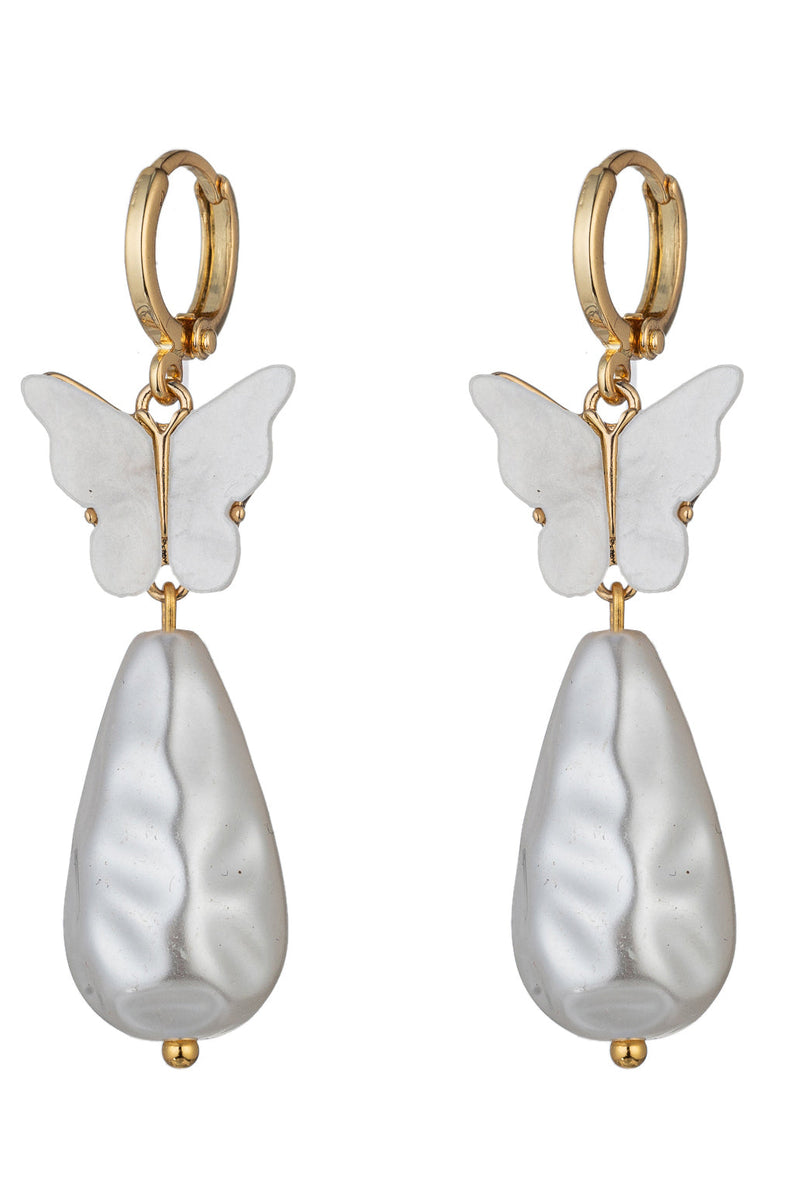 Manon Butterfly Cubic Zirconia Shell Pearl Earrings: Graceful Wings and Lustrous Pearls Take Flight.