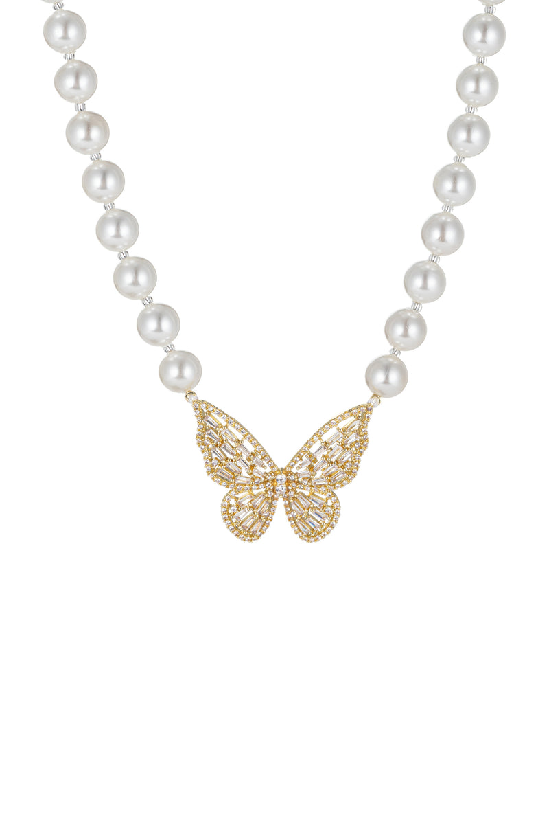 Shell pearl necklace with a brass CZ butterfly pendant.