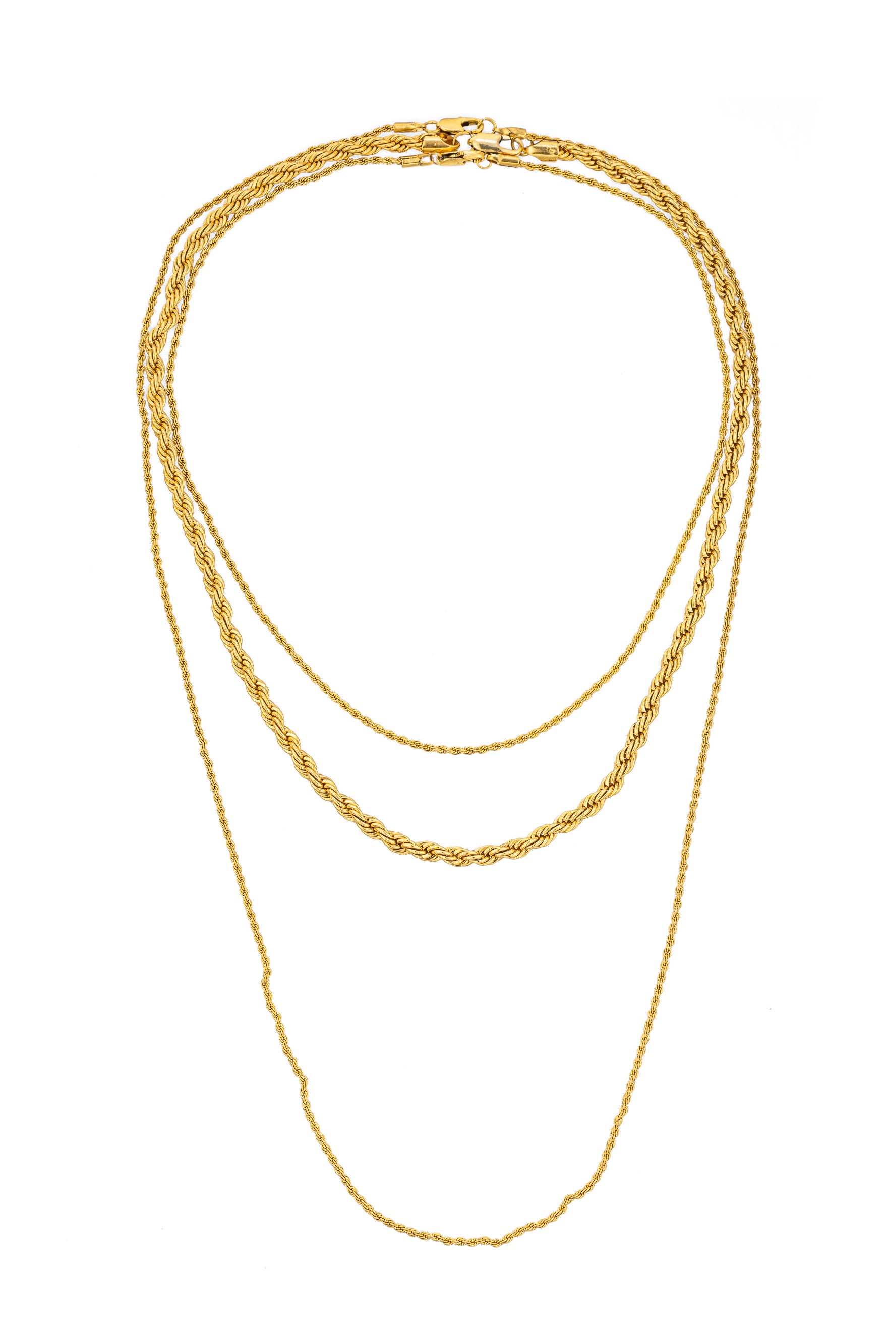 Gold tone titanium triple chain drop necklace.