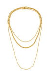 Gold tone titanium triple chain drop necklace.