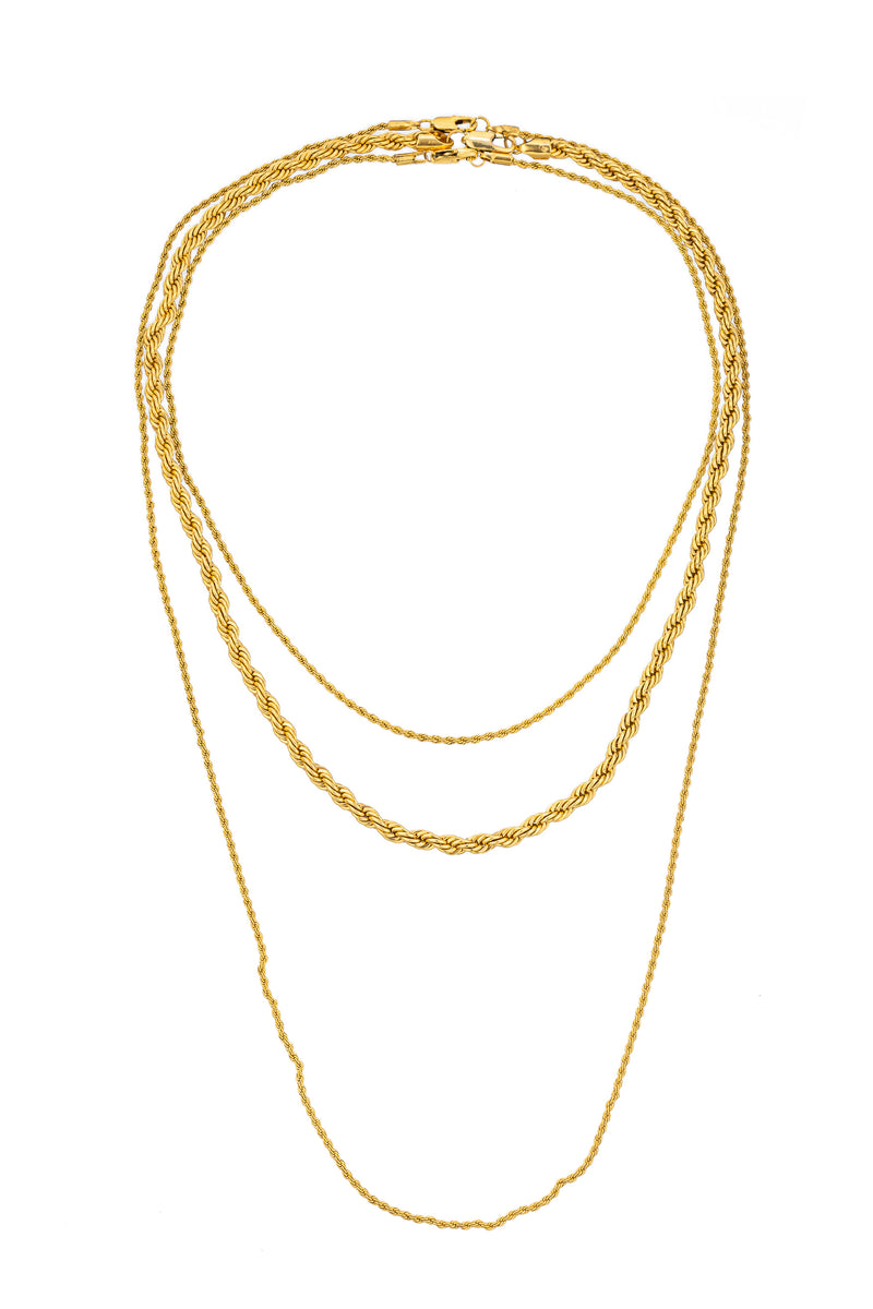 Gold tone titanium triple chain drop necklace.