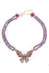 Purple agate beaded statement necklace with a glass crystal butterfly pendant.