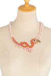 Rose quartz beaded statement necklace with a glass crystal flamingo pendant.