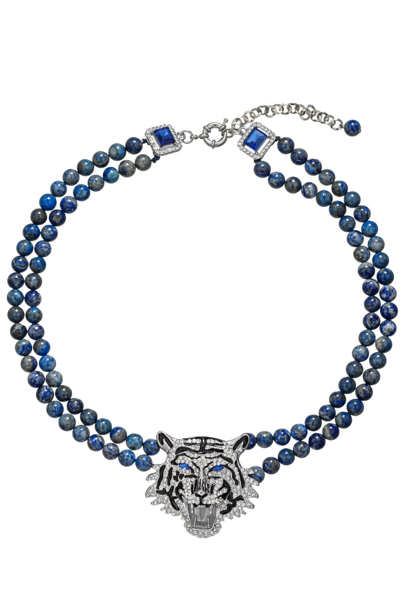 Embrace the allure of the wild with this beaded necklace, combining tiger agate and blue lapis stones for a captivating and unique accessory.