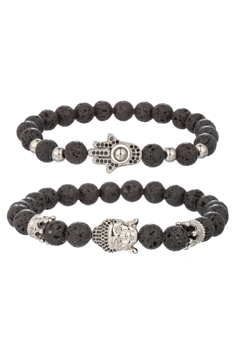 Silver tone titanium hamsa and buddha head pendants on a lava bead beaded bracelet.