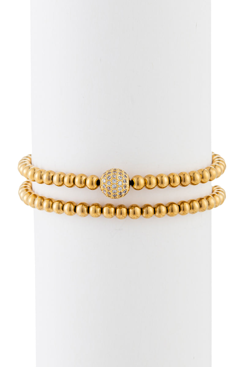 Gold titanium beaded bracelet with brass CZ charm.