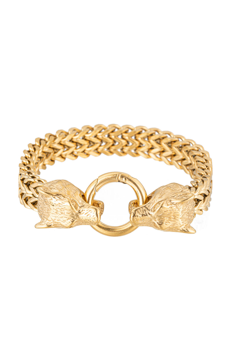 Gold tone titanium wolf head pendant chain bracelet.