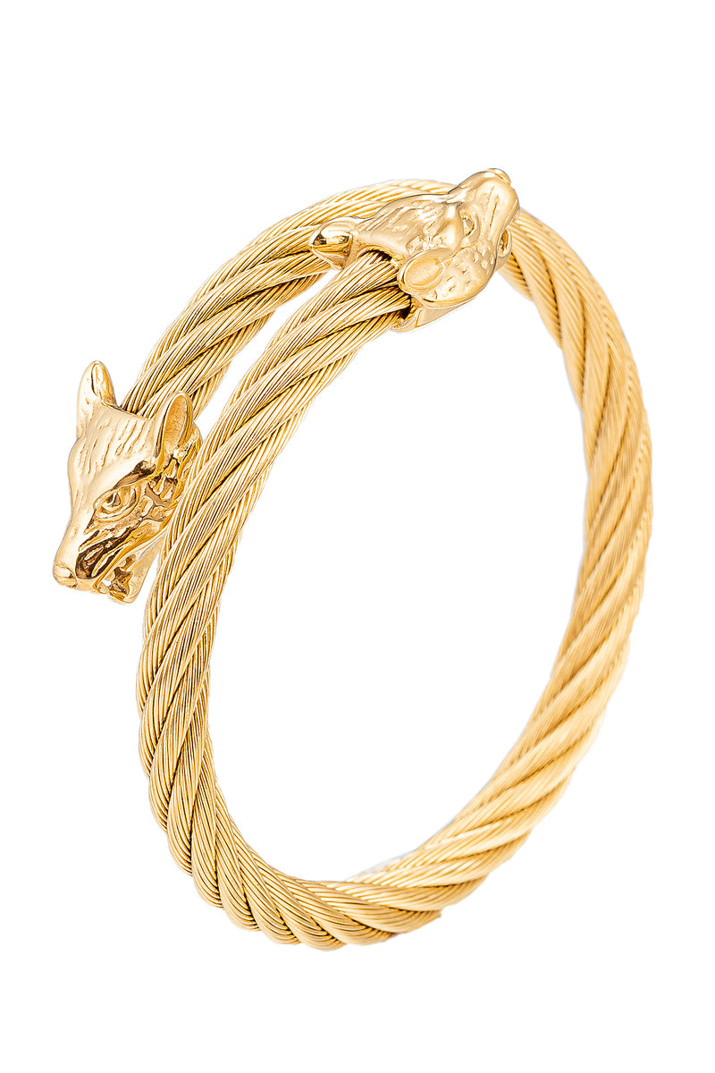 Gold tone titanium double wolf head coil wrap bracelet.