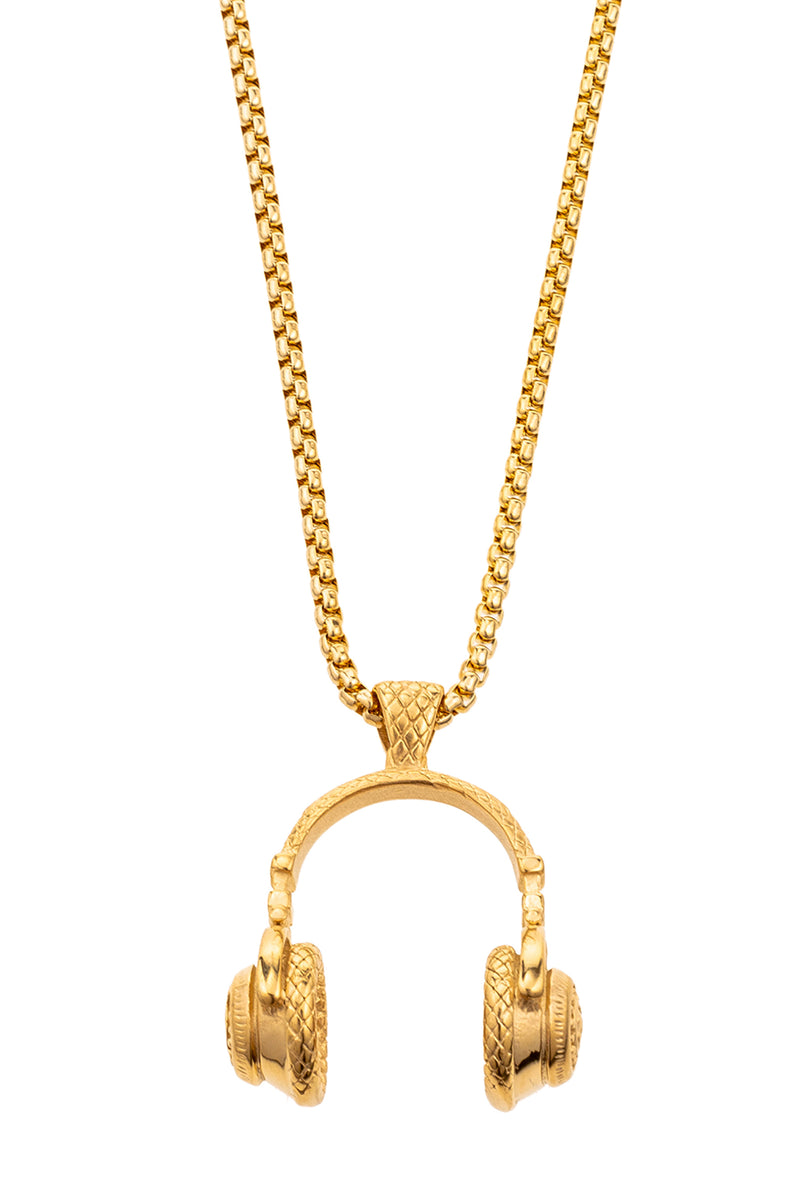 Small gold chain necklace with 1 inch pendant. Pendant is gold pair of old school headphones.