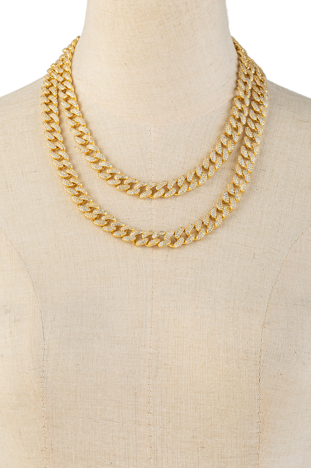 Set of 2 gold tone brass Cuban link necklace with cz crystals.