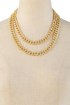 Set of 2 gold tone brass Cuban link necklace with cz crystals.